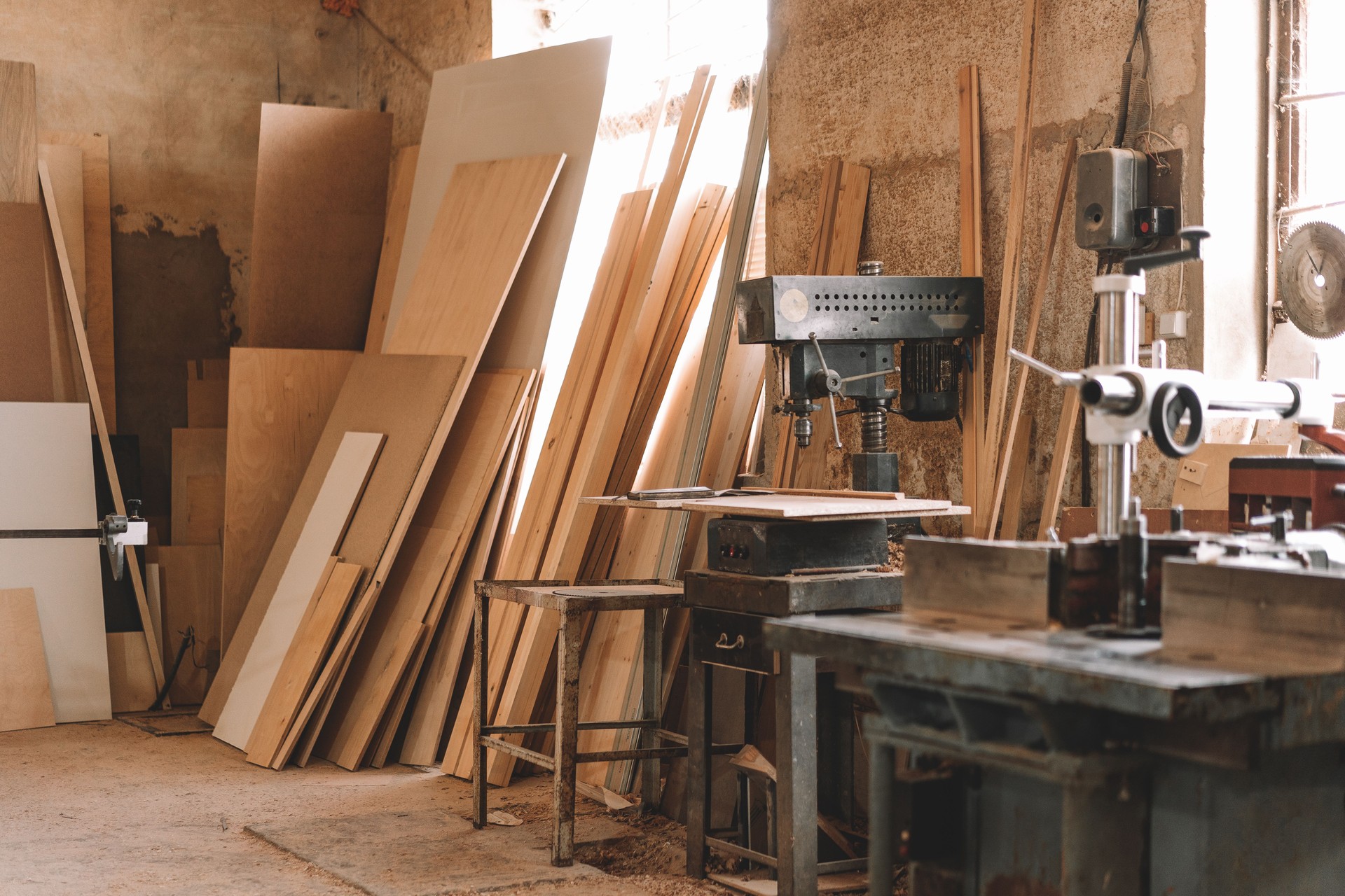 Carpentry shop interior with wood and tools